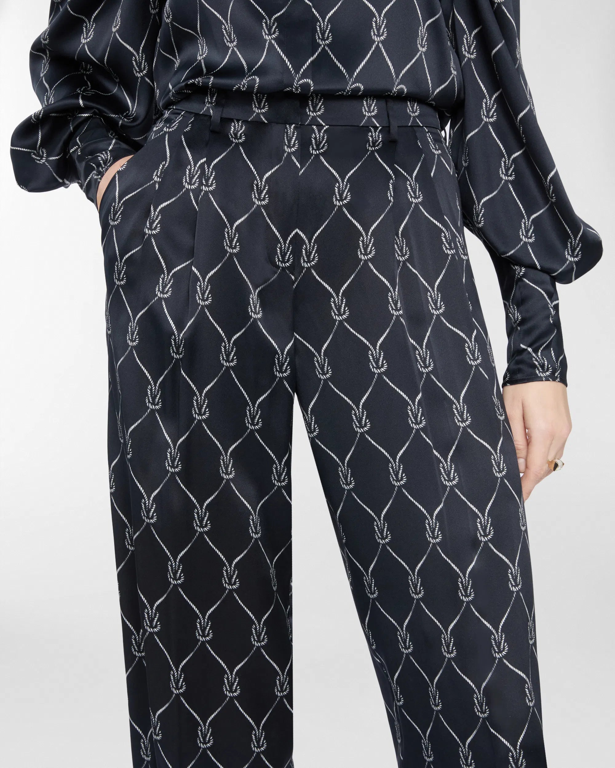 Pantaloni con stampa nappine in seta